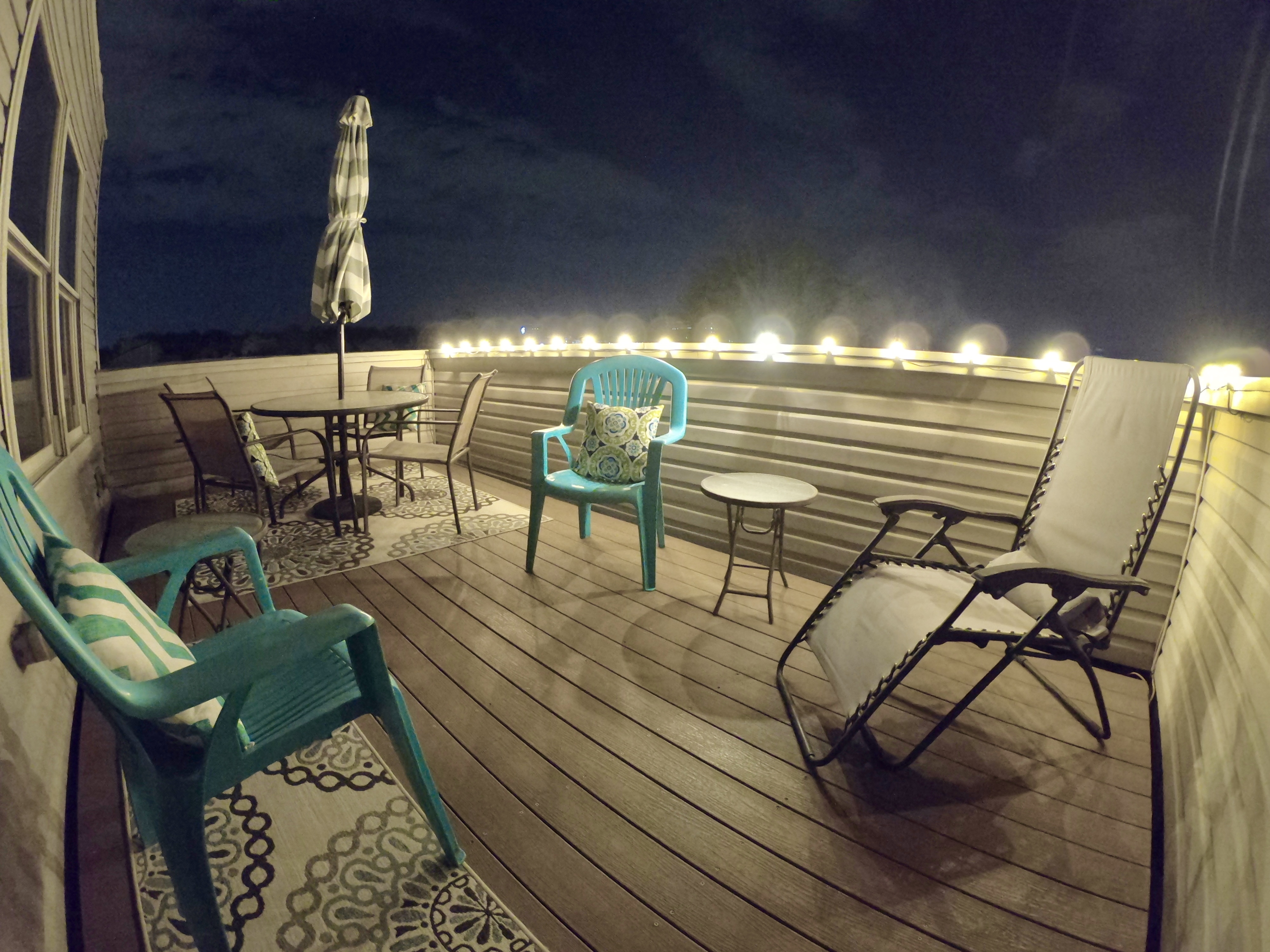 Talk about cozy and inviting! This rooftop deck at Night is even MORE AMAZING!