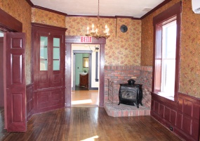 Built-In Cabinet and Gas Fireplace in Dining Room