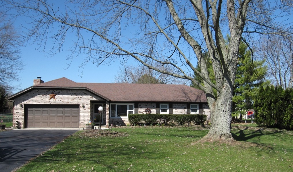 Picture of brick ranch located at 7000 Delisle Fourman Road in Arcanum Ohio.